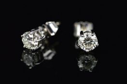 A PAIR OF 18CT WHITE GOLD DIAMOND STUD EARRINGS, the brilliant cut diamonds within five claw