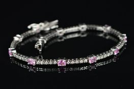 A MODERN 18CT WHITE GOLD PINK SAPPHIRE AND DIAMOND LINE BRACELET, bar sections of modern round