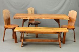 REYNOLDS OF LUDLOW, a yew wood dining suite, in the style of George Nakashima, comprising of a