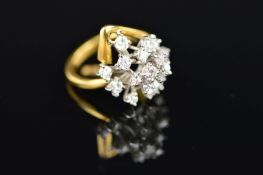 A MODERN ABSTRACT DIAMOND CLUSTER RING, a tiered design of modern round brilliant cut diamonds