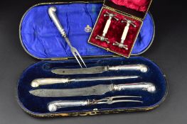 AN EDWARDIAN SILVER PISTOL HANDLED FIVE PIECE GAME AND MEAT CARVING SET, Carrington & Co of Regent