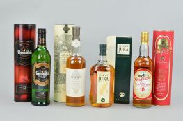 FOUR BOTTLES OF SINGLE MALT, to include a bottle of Isle of Jura Single Malt Scotch Whisky from