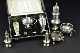 AN ELIZABETH II SILVER SUGAR CASTOR, of baluster form, knopped finial, pull off cover, makers C J