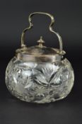 A GEORGE V SILVER MOUNTED GLASS BISCUIT BARREL, swing handle, makers Alexander Clark & Co Ltd,