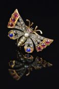 A LATE 19TH/EARLY 20TH CENTURY GOLD GEMSTONE BUTTERFLY BROOCH, set with rubies, sapphires, rose