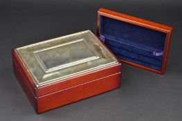 AN ELIZABETH II SILVER MOUNTED MAHOGANY FINISH JEWELLERY BOX, blue velvet lined interior, makers