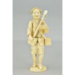 A LATE 19TH CENTURY JAPANESE SECTIONAL IVORY OKIMONO OF A MAN CARRYING A SHAMISEN AND BACHI, with