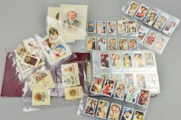 A CIGARETTE CARD AND SILKS COLLECTION, in a ring binder album featuring mainly cinema and film