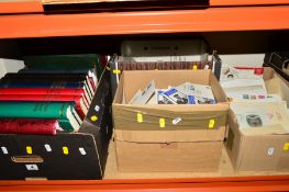 AN ACCUMULATION OF STAMPS AND COVERS, in sixteen albums and loose (four boxes)