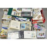 AN ACCUMULATION OF GREAT BRITISH STAMPS, with Decimal issues in mint block presentation packs, First