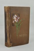 AN EARLY 20TH CENTURY ALBUM, containing approximately 400 greeting cards from the Victorian/
