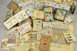 A COLLECTION OF CIGARETTE AND TRADE CARDS, loose, in cigarette packets, loosely inserted or stuck