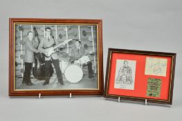 A BUDDY HOLLY AUTOGRAPH, a framed montage comprising a verso signed photograph of Buddy Holly and