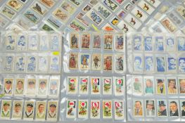 A LARGE COLLECTION OF CIGARETTE CARDS, loosely inserted in plastic sleeves, featuring