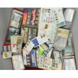 A COLLECTION OF GREAT BRITAIN STAMPS, in eight albums with presentation packs, Mint Decimal sets,