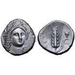 Lucania, Metapontion AR Stater. Circa 330-290 BC. Atha-, magistrate. Head of Demeter, wearing