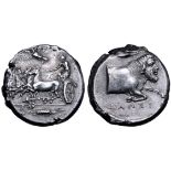 Sicily, Gela AR Tetradrachm. Circa 415-405 BC. Charioteer holding kentron and reins, driving fast