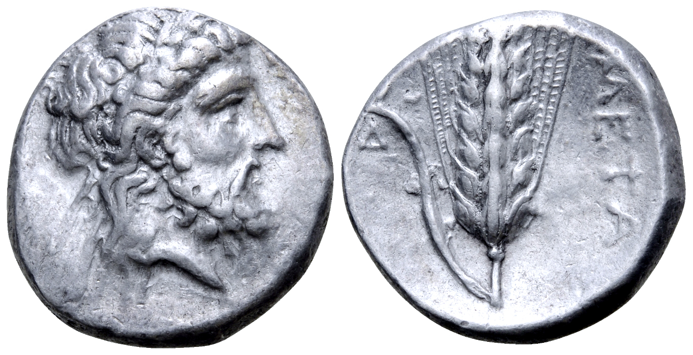"Lucania, Metapontion AR Stater. Circa 333-330 BC. Laureate head of Zeus right, [ΕΛΕΥΘΕΡΙΟΣ] before,