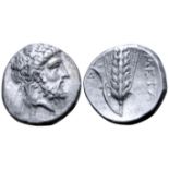 "Lucania, Metapontion AR Stater. Circa 333-330 BC. Laureate head of Zeus right, [ΕΛΕΥΘΕΡΙΟΣ] before,