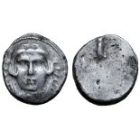 Etruria, Populonia AR 20 Asses. Circa 300-250 BC. Facing head of Hercle, wearing lion’s skin knotted