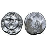 Etruria, Populonia AR 20 Asses. Circa 300-250 BC. Facing head of Metus, hair bound with diadem; X: