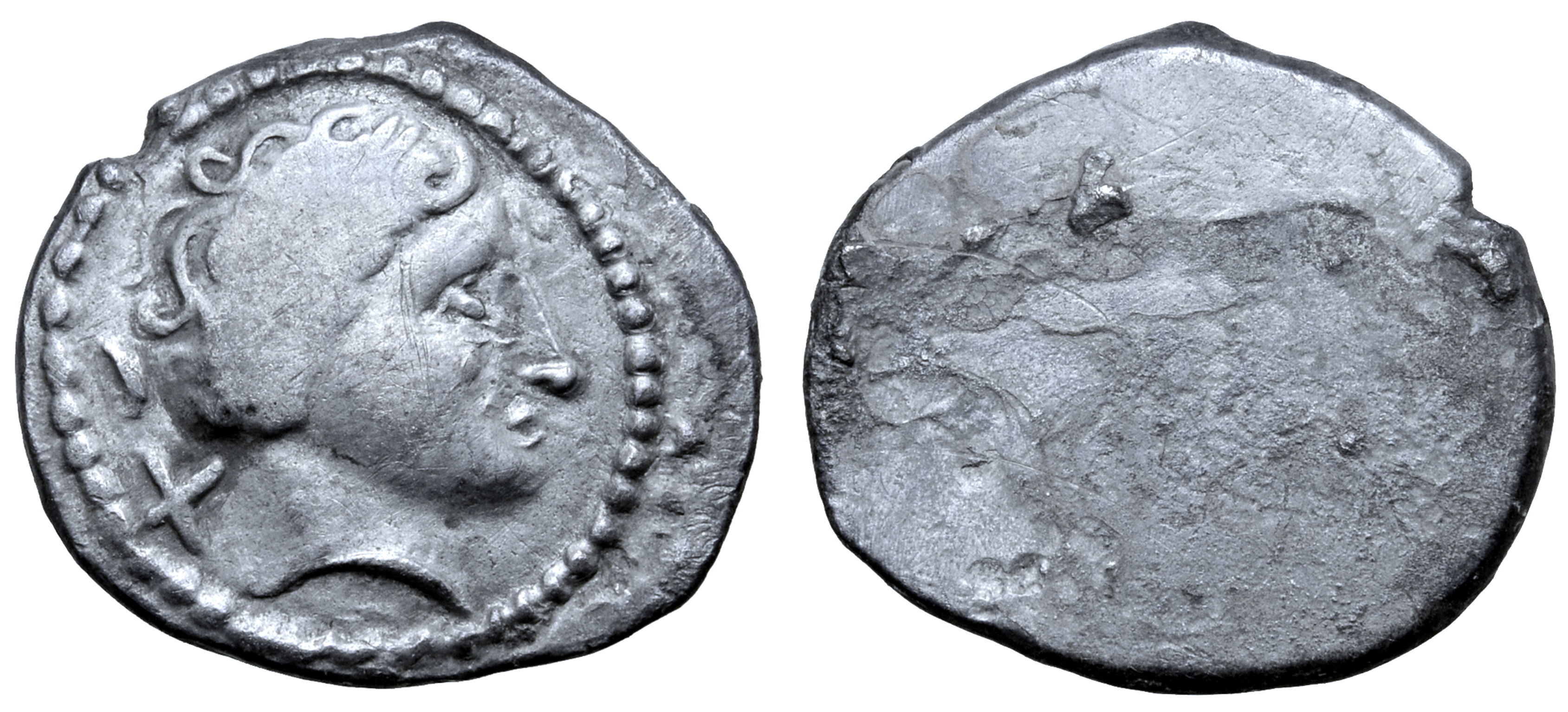 Etruria, Populonia AR 10 Asses. Circa 300-250 BC. Wreathed female head right; + behind / Blank. EC