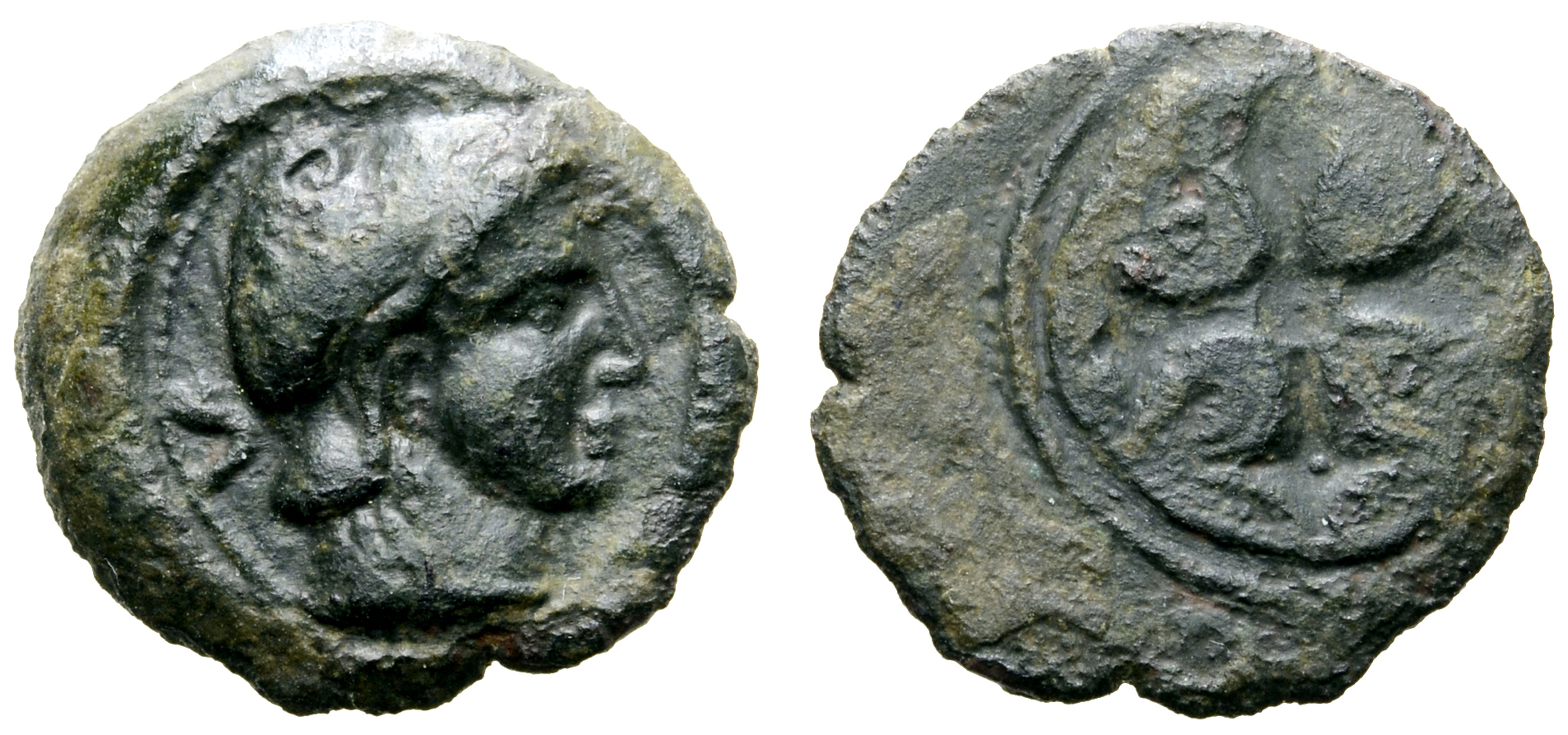 Etruria, Populonia Æ 5 Units. Late 4th - 3rd century BC. Head right, wearing Phrygian helmet; V