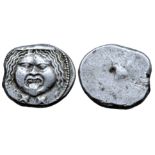 Etruria, Populonia AR 20 Asses. Circa 300-250 BC. Facing head of Metus, hair bound with diadem; X