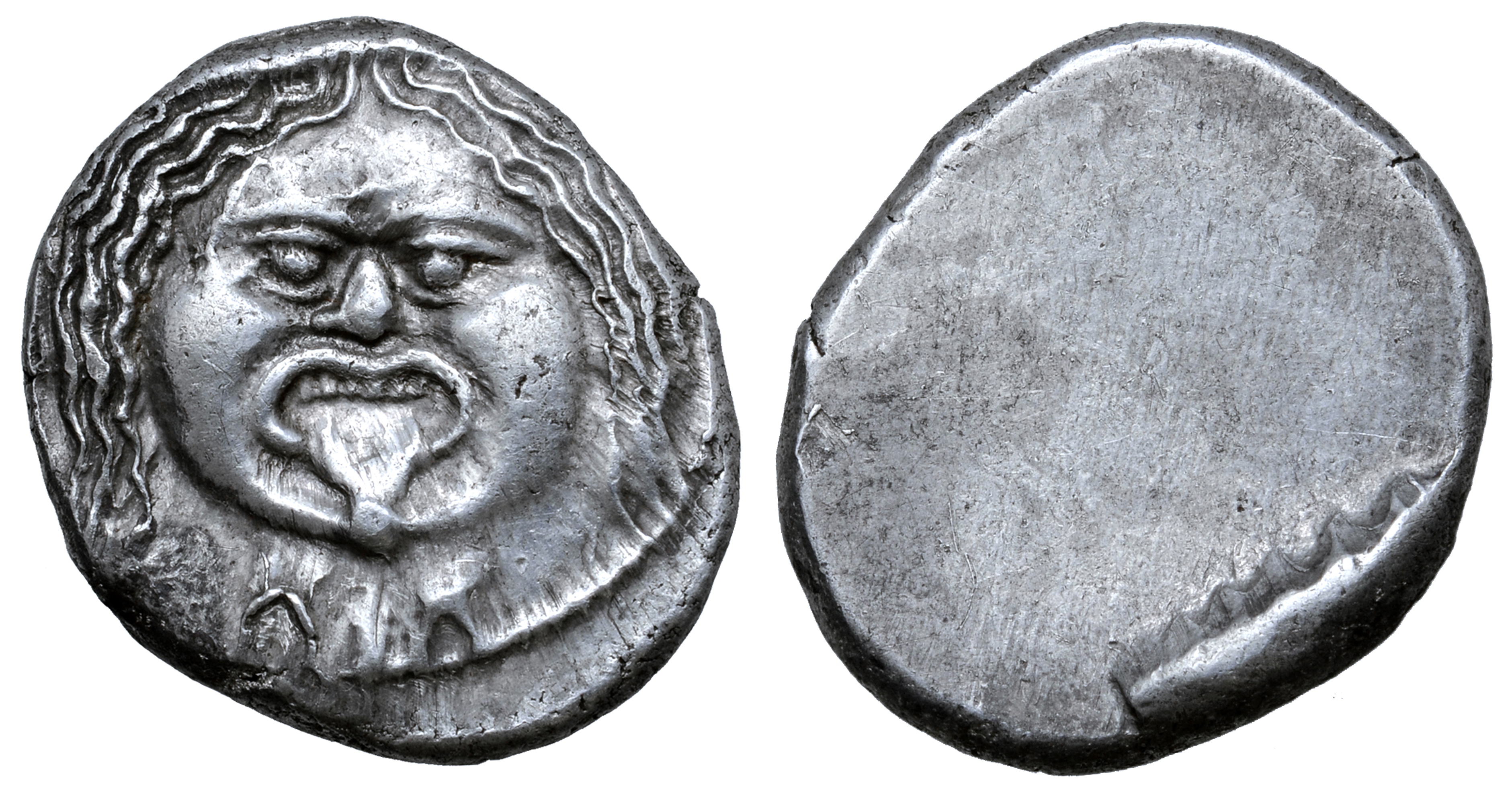 Etruria, Populonia AR 20 Asses. Circa 300-250 BC. Facing head of Metus, hair bound with diadem; X: