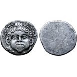 Etruria, Populonia AR 20 Asses. Circa 300-250 BC. Facing head of Metus with curly hair and torque-