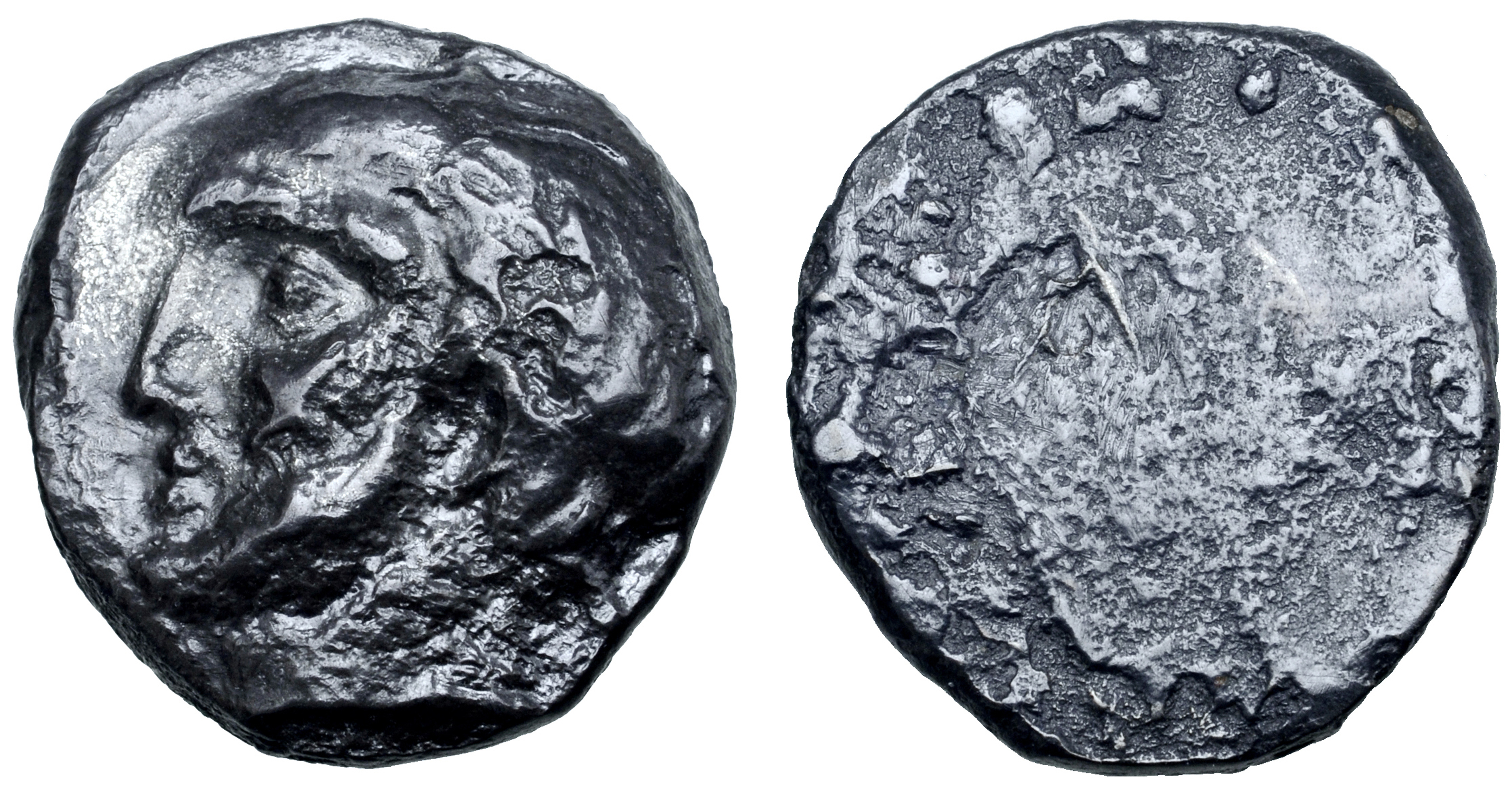 Etruria, Lucca(?) AR 5 Units. Circa 325-300 BC. Bearded and laureate head left, [? behind] /