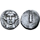 Etruria, Populonia AR 20 Asses. Circa 300-250 BC. Facing head of Hercle, wearing lion’s skin knotted