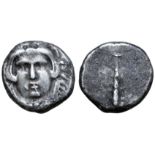 Etruria, Populonia AR 20 Asses. Circa 300-250 BC. Facing head of Hercle, wearing lion’s skin knotted