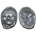 Etruria, Populonia AR 20 Asses. Circa 300-250 BC. Facing head of Metus, hair bound with diadem; X