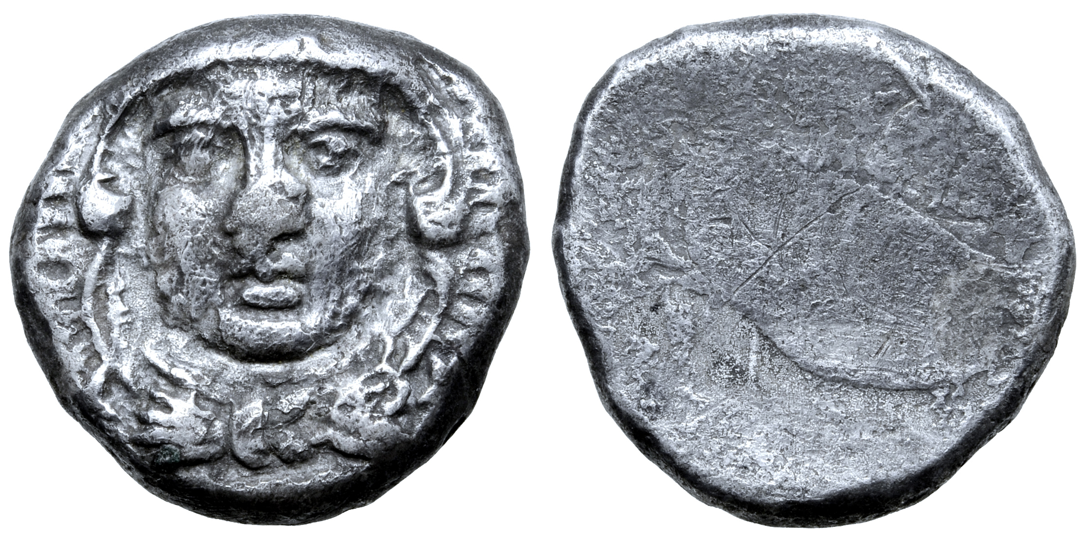 Etruria, Populonia AR 20 Asses. Circa 300-250 BC. Facing head of Hercle, wearing lion’s skin knotted