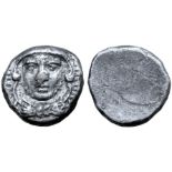 Etruria, Populonia AR 20 Asses. Circa 300-250 BC. Facing head of Hercle, wearing lion’s skin knotted