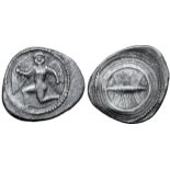 Etruria, Vulci AR Didrachm. 5th - 4th century BC. Winged Metus running to left, head facing, holding