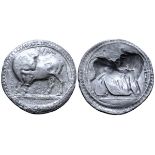 Lucania, Sybaris AR Stater. Circa 530-510 BC. Bull standing left, head right; VM above / Incuse bull