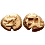 Mysia, Kyzikos EL Stater. Circa 500-450 BC. Dog standing left, fore-paw raised; tunny fish to left