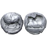 Lucania, Sybaris AR Stater. Circa 530-510 BC. Bull standing left, head right; VM above / Incuse bull