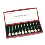 CASED SET OF SILVER COMMEMORATIVE SPOONS