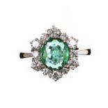 18CT WHITE GOLD EMERALD AND DIAMOND RING