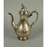 A Victorian silver coffee pot, Sheffield c.1867, James Dixon & Sons Ltd., leaf and pod finial to the