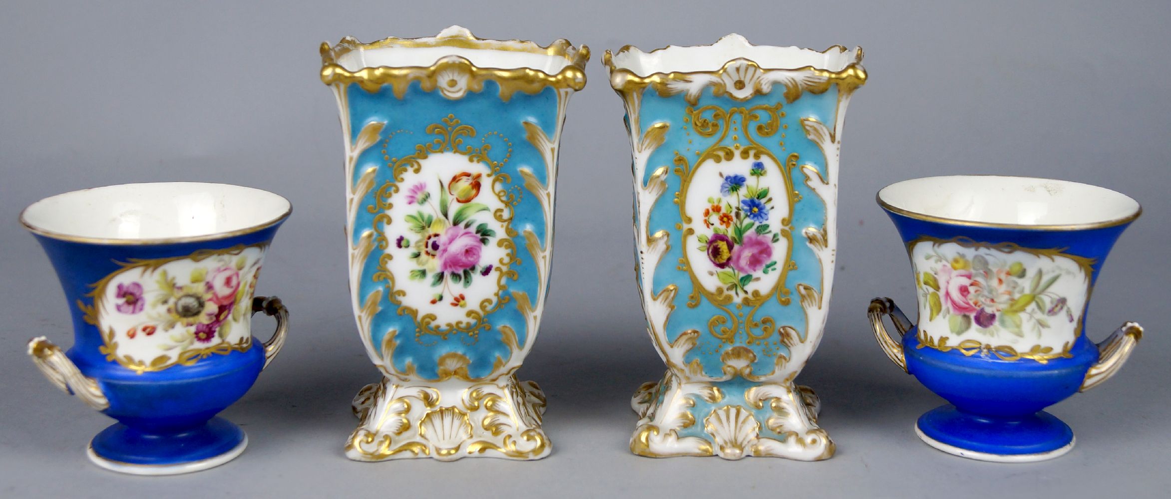 A pair of Continental Sevres style square vases, late 19th century, decorated with reserves of