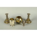 A pair of Eastern silver candlesticks, import marks for London 1886, Hukin and Heath, with foliate