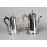 A silver coffee pot, Sheffield c.1969, James Dixon & Sons Ltd., 23.5cm high, together with