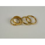 Four 22ct. gold band ringsTotal weight approx. 15.5g, (4)