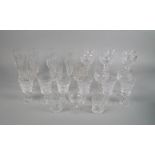 A harlequin set of six globular hock glasses, 20th century, with cut form decoration, 19cm high,