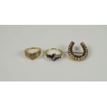 A 14ct. gold, diamond ring, 18ct. gold diamond and sapphire ring and gem horseshoe broochthe diamond