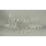 A collection of twelve Rosenthal Studio line champagne flutes with petal form stems supporting